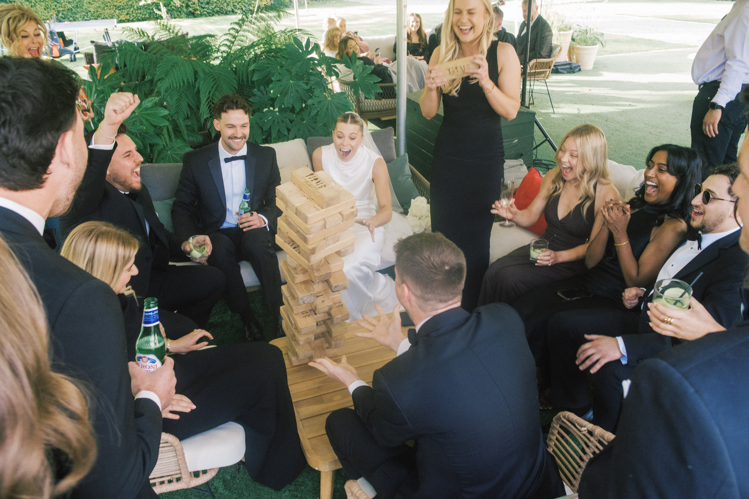 bride and groom having fun with wedding games